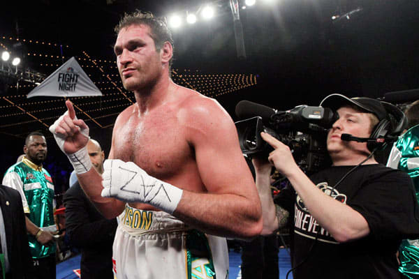 Tyson Fury poses after his seventh round KO vs. Steve Cunningham on April 20 at Madison Square Garden. (AP)